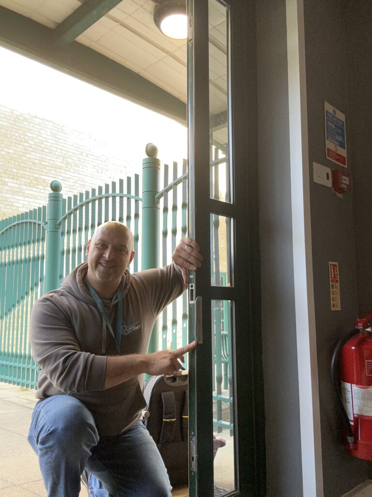Andy repairing a jammed uPVC door lock mechanism in Harlow